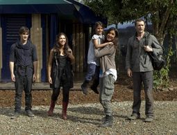 Shelley Conn, Jason O'Mara, Landon Liboiron, and Alana Mansour in Terra Nova (2011)