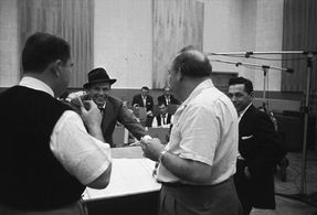 Frank Sinatra in the recording studio with Billy May circa 1959