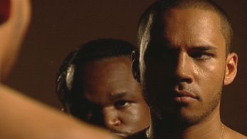 Damola Adelaja and Danny Parsons in Rag Tag (2006)