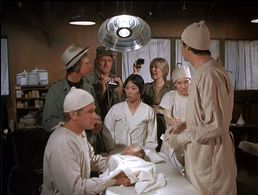 Alan Alda, William Christopher, Larry Linville, Saachiko, Wayne Rogers, Patricia Stevens, and Loretta Swit in M*A*S*H (1