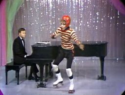 Billy Barnes and Judy Carne in Rowan & Martin's Laugh-In (1967)