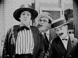 Helen Gilmore, Harold Lloyd, and George Rowe in Never Weaken (1921)