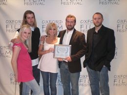 Brad Helmink, John Rauschelbach, Owen Szabo, Mandi Kreisher, and Deanna Cramer in The Lodge (2008)