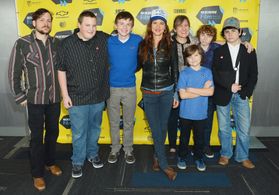 Juliette Lewis, Kat Candler, Jonny Mars, Deke Garner, Josh Wiggins, Dylan Cole, Camron Owens, and Dalton Sutton at an ev