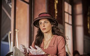 Razane Jammal as Emily in Kira & El Gin