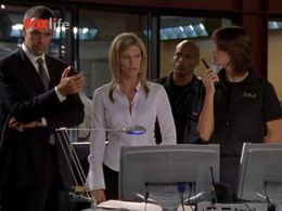 Natasha Henstridge and Alexandra Paul in She Spies (2002)