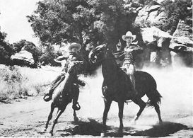 Sammy Baugh and Duncan Renaldo in King of the Texas Rangers (1941)