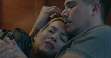 Desiree Del Valle and Boom Labrusca in Dear God (2022)