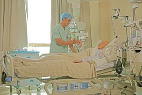 Daniel Wu and Baihe Bai in Go Away Mr. Tumor (2015)