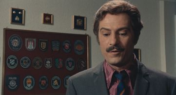 Nino Manfredi in Bread and Chocolate (1974)