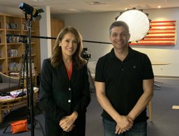 Still of Maria Espinoza and Jack Thomas Smith on the set of Newsfront: America Under Siege (2023)