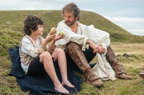 Hendry Earnshaw with Young Heathcliff in Wuthering Heights