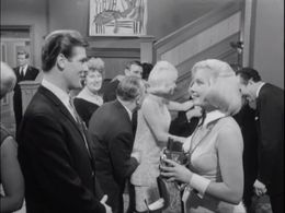 Roger Moore and Jacqueline Ellis in The Saint (1962)