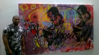 Darius Cottrell with one of Skyler Grey's piece from Skyler Grey's 