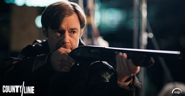 Production Still: County Line. R. Keith Harris as Deputy Sloan