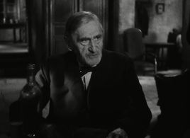 Maurice Schutz in It Happened at the Inn (1943)