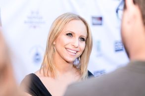 Alexis Brandt, during red carpet interview at premier of Alleluia! The Devil's Carnival (2016)