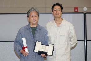 Park Chan-wook and Park Hae-il at an event for Decision to Leave (2022)