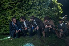 Simon Pegg, Asa Butterfield, Isabella Laughland, Kit Connor, Max Raphael, Hermione Corfield, and Finn Cole in Slaughterh
