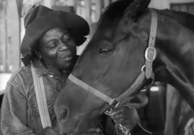 John Larkin and Tommy Boy in Sporting Blood (1931)