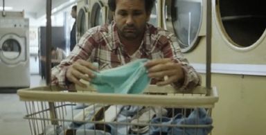 Still of Danny Minnick and The Postal Service in The Postal Service : A Tattered Line Of String