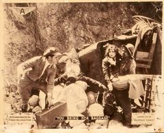 Charlotte Burton, Irving Cummings, and George Periolat in The Diamond from the Sky (1915)