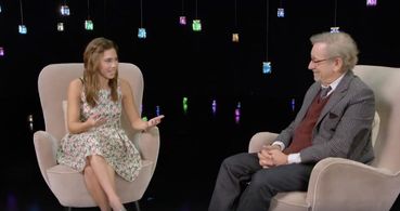 Still of Janelle Marie in sit down interview alongside of Steven Speilberg behind the scenes of The BFG
