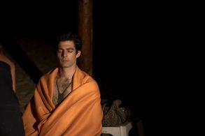 On set of Watch Over Me - actor Guy Kapulnik warming up