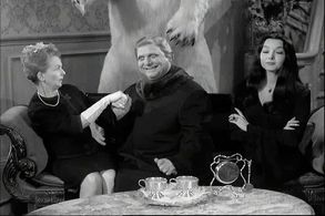 Jackie Coogan, Carolyn Jones, and Meg Wyllie in The Addams Family (1964)