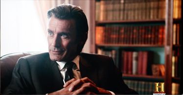 Paul Spriggs as George Remus in The Booze Bets & Sex That Built America.