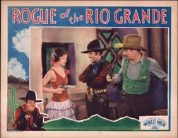 Myrna Loy, José Bohr, and Walter Miller in Rogue of the Rio Grande (1930)