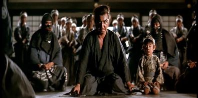 Tomisaburô Wakayama and Akihiro Tomikawa in Lone Wolf and Cub: Baby Cart in the Land of Demons (1973)