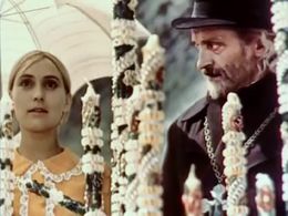 Larisa Kadochnikova and Vasyl Symchych in Bilyy ptakh z chornoyu oznakoyu (1971)