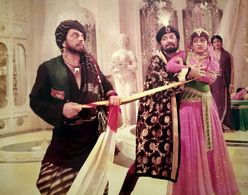 Dharmendra, Hema Malini, and Prem Chopra in Adventures of Ali-Baba and the Forty Thieves (1980)