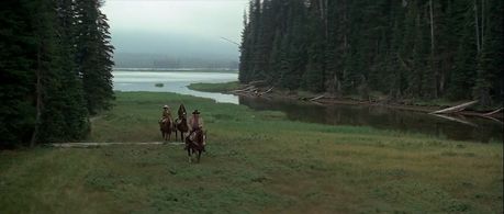 Katharine Hepburn, John Wayne, and Richard Romancito in Rooster Cogburn (1975)