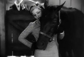 Madge Evans and Tommy Boy in Sporting Blood (1931)