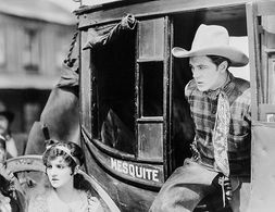 Gary Cooper and Betty Jewel in Arizona Bound (1927)