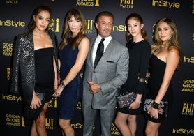 Sylvester Stallone, Jennifer Flavin, Sophia Rose Stallone, Sistine Rose Stallone, and Scarlet Rose Stallone at an event 