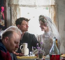 Evgeniy Tkachuk and Darya Ursulyak in And Quiet Flows the Don (2015)