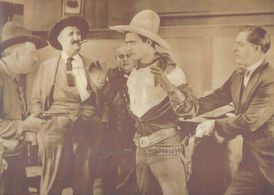 Clarence Burton, Charles McHugh, Tom Mix, George Nichols, and Val Paul in Fame and Fortune (1918)