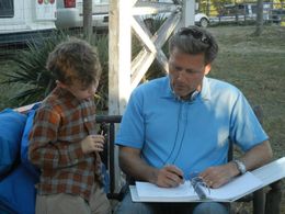Studying David Baldacci writing his next novel on set of Wish You Well