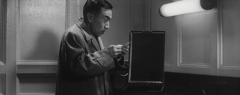 Kô Nishimura in The Bad Sleep Well (1960)