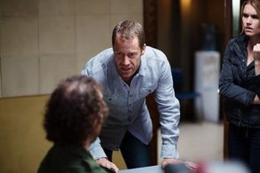 Sinister Man (Kyle Mitchell) getting interrogated by William (Colin Ferguson) and Audrey Parker (Emily Rose) at Haven PD