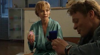 Ekaterina Semyonova and Pavel Maykov in Igra na vybyvanie (2004)