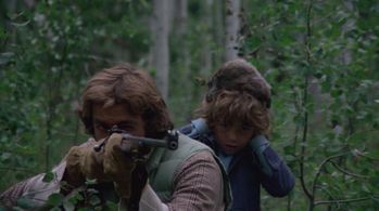 Ham Larsen and Robert Logan in The Adventures of the Wilderness Family (1975)