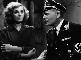 Dennis Hoey and Anna Sten in They Came to Blow Up America (1943)
