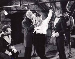 Douglas Fairbanks Jr., John Emery, Frank Hagney, Akim Tamiroff, and H.B. Warner in The Corsican Brothers (1941)
