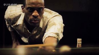 Kenny-Lee Mbanefo playing the role of a Gangster named 'Ice Pick Red' in the Docu series The Real Story of 'American Gan