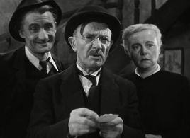 Arthur Devère, Marcelle Hainia, and Robert Le Vigan in It Happened at the Inn (1943)