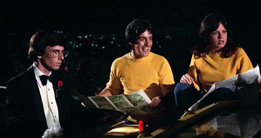 Debra Clinger, Joel Kenney, and David Naughton in Midnight Madness (1980)